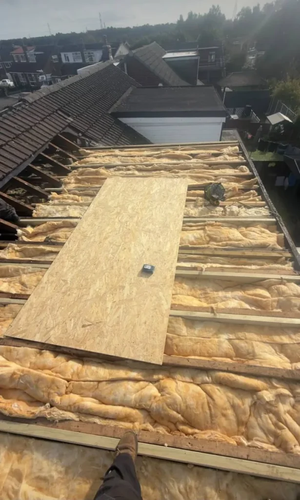 Flat roof deck being replaced