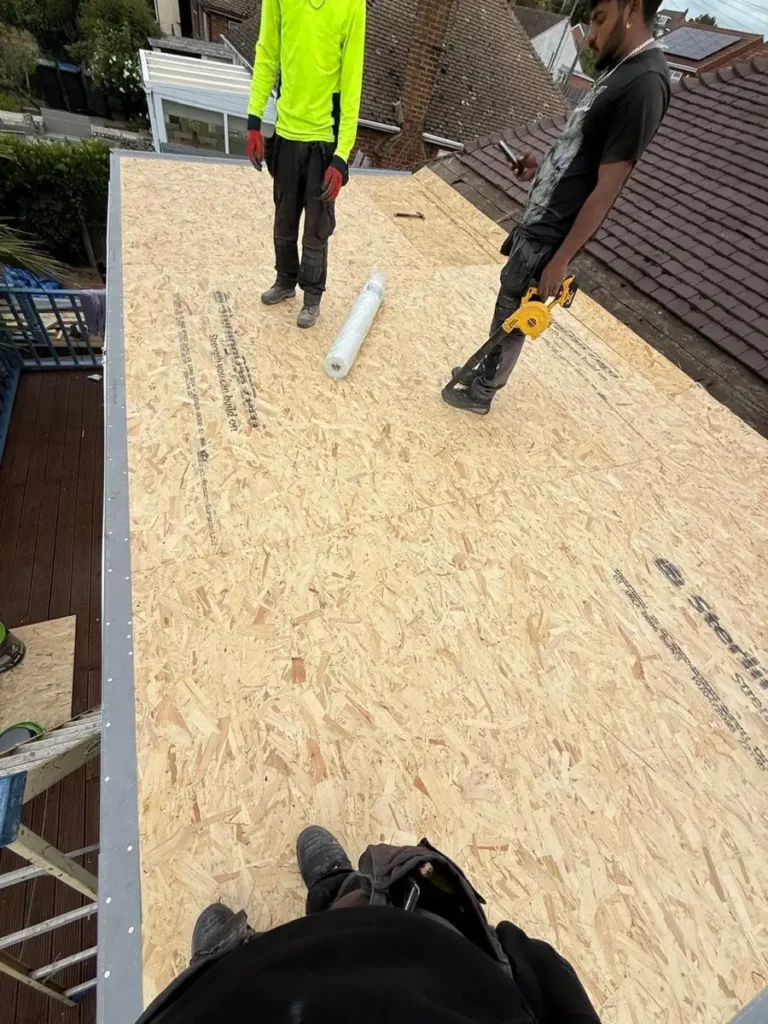 New timber deck going down on a flat roof